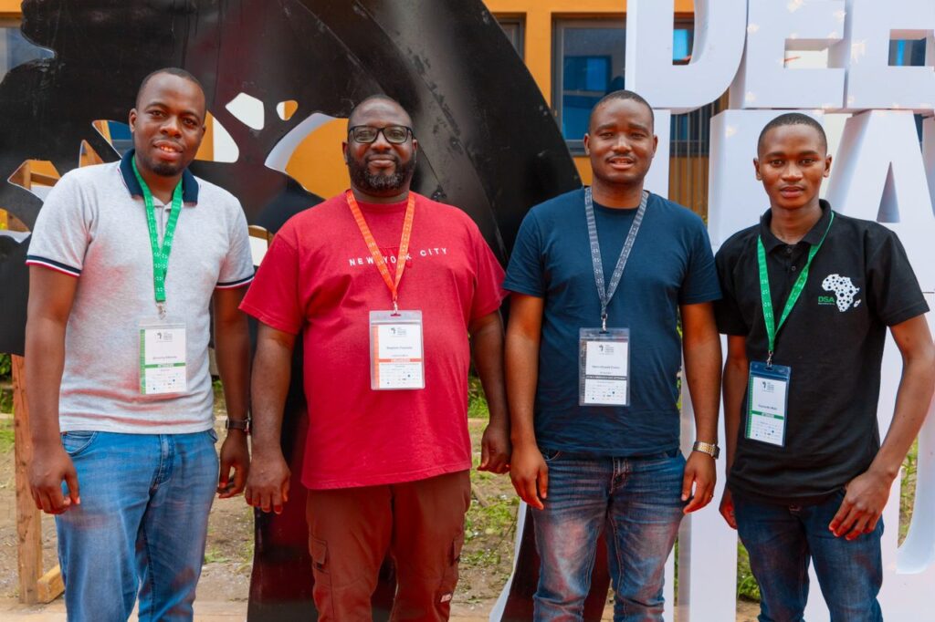 Samkelo Msibi (right) with Dr. Henri-Count Evans and other participants at the Deep Learning conference in Senegal.